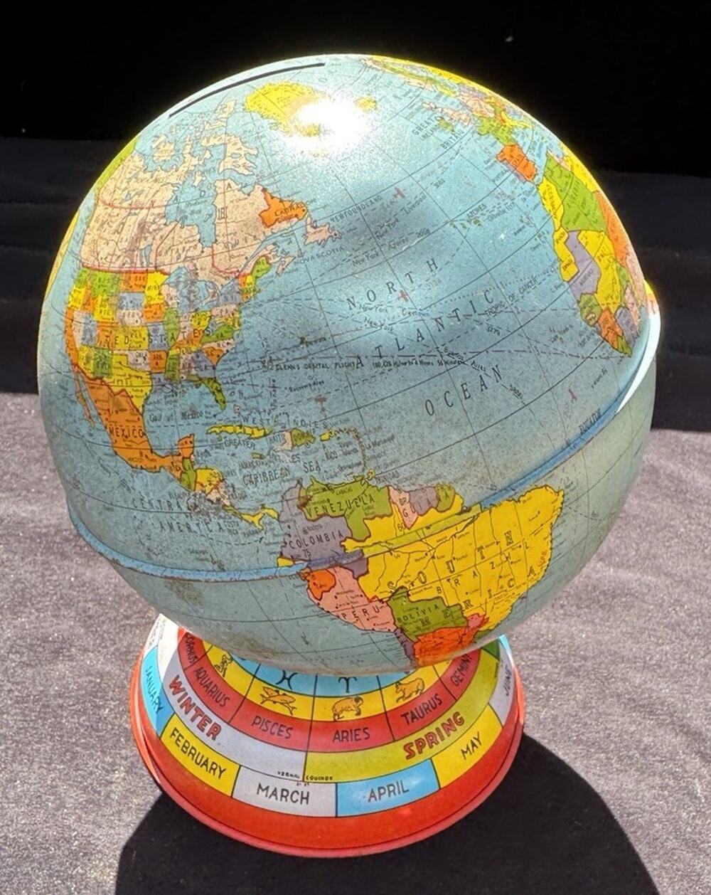 Vintage Metal Globe Coin Bank By Ohio Art Co with Months Seasons Zodiac Signs